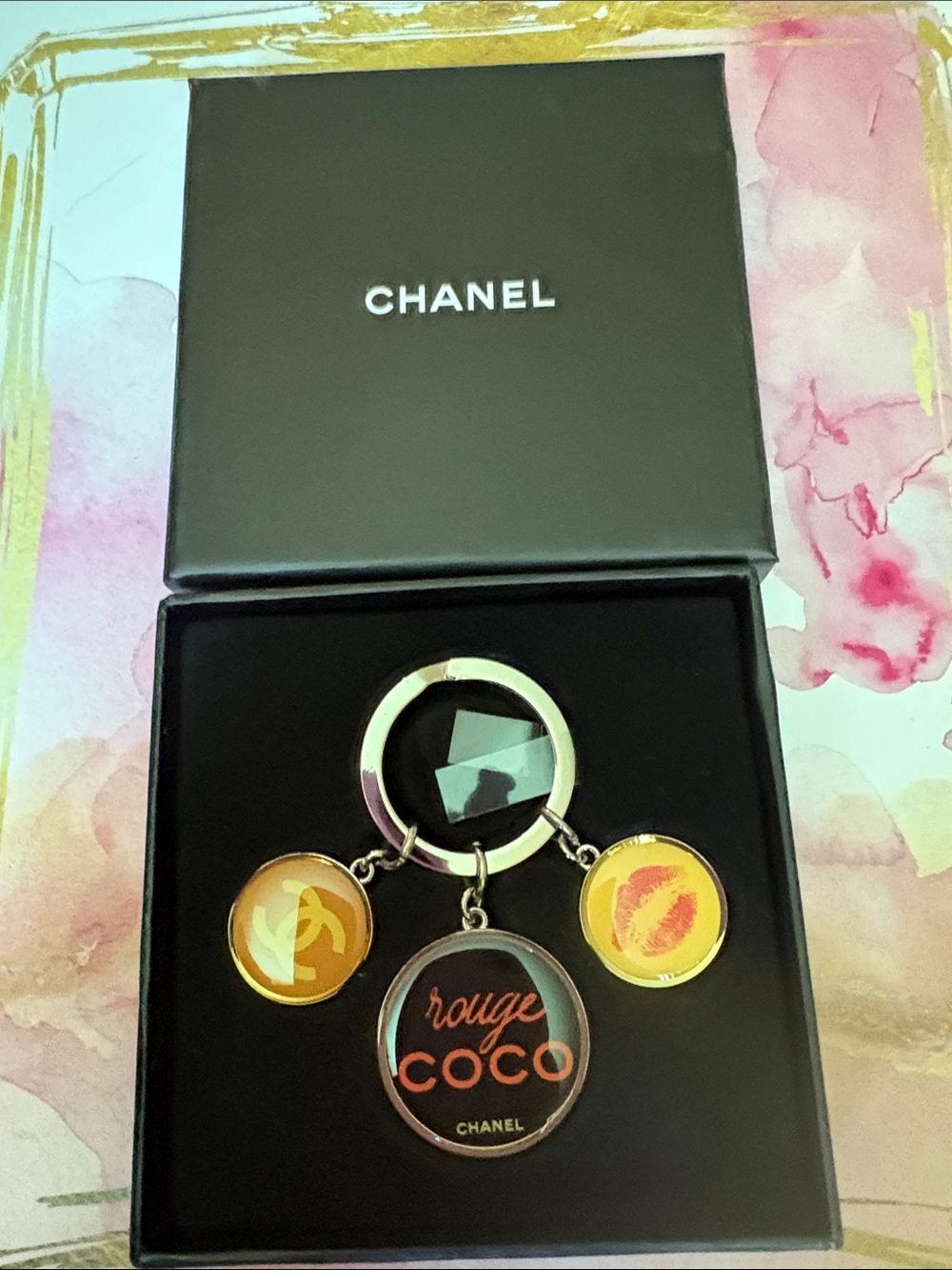 CHANEL Orange and Black 'Rouge Coco' Keychain Charm for purse or keys NWB